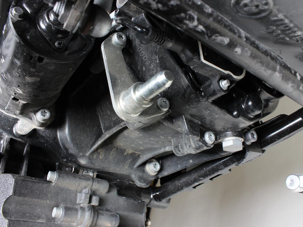 Figure 5 7. Unscrew the clamp s bracket off the engine (Figure 6).