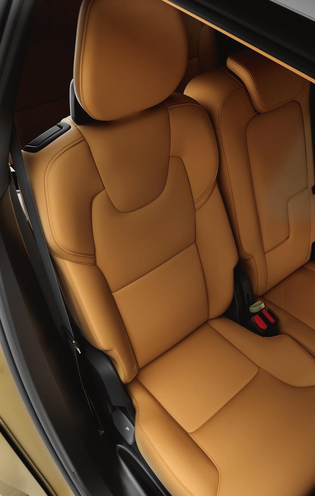 FOLDING THE REAR SEAT BACKRESTS It may be necessary to move the front/second row seats in order to fold down the second row backrests completely. Second row of seats, center position 1.