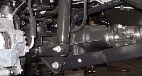 Shock Absorber Bolt & Nut Positive Cable Negative Cable Axle Prepare to Install Front Suspension 5. Remove track bar. a.