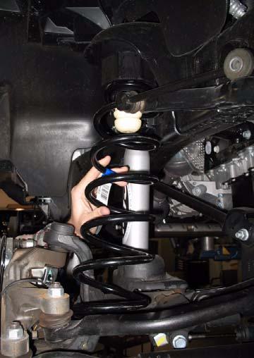 Install Front Suspension 1. Install two kit spring (spacers) onto upper perch. Kit Spring (Spacer) Perch 3.