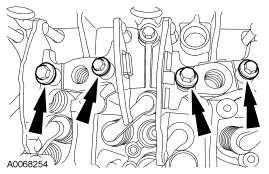 Remove the 8 bolts and the rocker arm assemblies. Fig.
