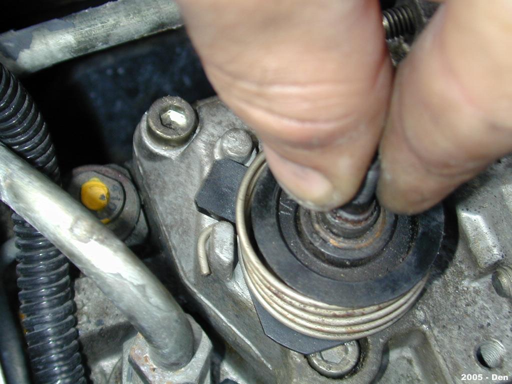 14 October 2009 1040178 1988-93 Dodge VE Fuel Pin 20 15. Install the throttle shaft spring assembly.