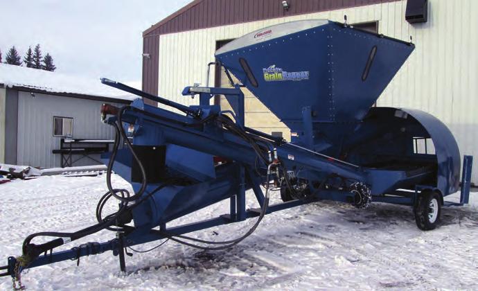 The unit is equipped with a large hopper on top for combines or grain carts to unload into.