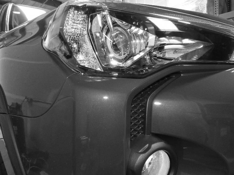 37. Remove fog lights from back of bumper. 38. Remove fog light surround from bumper. Trim here 39.