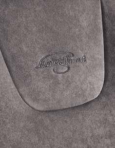 equal measure. LOGO The Laurin & Klement logo embroidered on the leather seat backrests is the stamp of exclusivity.
