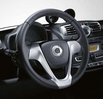 > 2 3-spoke leather sports steering wheel with steering wheel gearshift: Covered with fine leather for a good grip.
