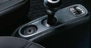 Cleverly and unobtrusively integrated under the floor mat in the passenger footwell.