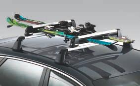 Xtender ski & snowboard carrier To ease loading and unloading, the carrier can be extended sideways so that clothes and car need not come into contact.