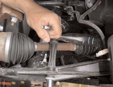 Remove the tie rod end from the knuckle by striking the knuckle to dislodge the tie rod end.