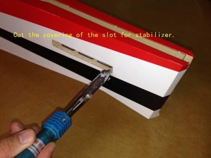 Stabilizer/Elevator Assembly: Cut the covering of the slot