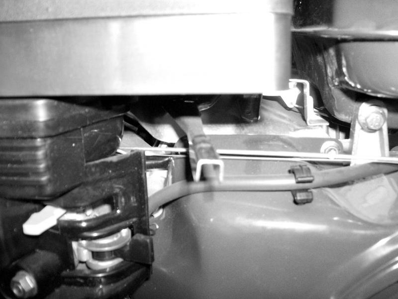FIGURE H STARTER HANDLE FIGURE J THROTTLE CHOKE LEVER FUEL VALVE 5. After the Engine starts and warms up, slowly move the Choke Lever to its RUN position. (See Figure H.