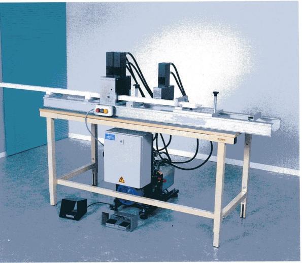 OPL 860 Hydraulic driven machine Desctription: It is a simple hydraulic driven machine for cutting and punching head and bottom rail. Equipped with all tool gates and drives.