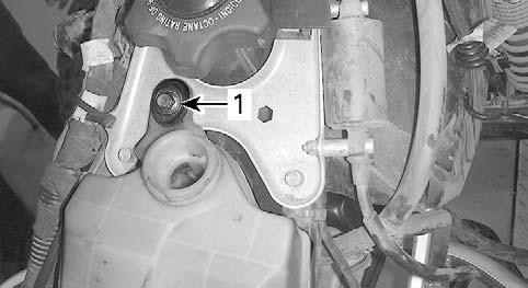 11. Remove the coolant reservoir bolt and move reservoir aside to make room. vmr2008-009-028_a 1.