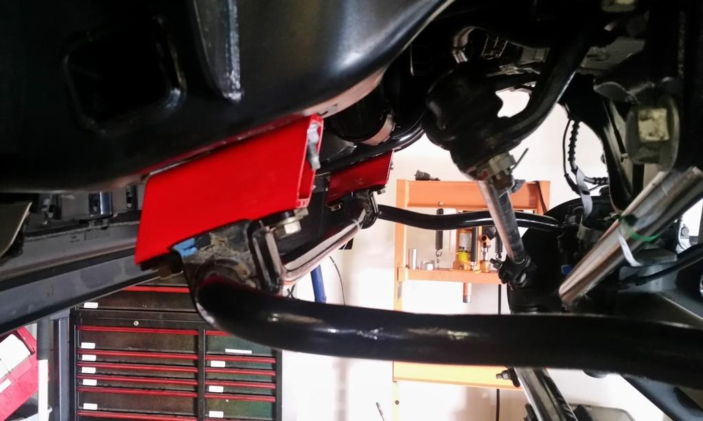 Install the ReadyLIFT sway bar drops to the frame using factory hardware. Torque to 35 ft-lbs.