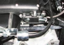 Install the passenger side PCV hose by sliding it onto the front barb located on the passenger side valve