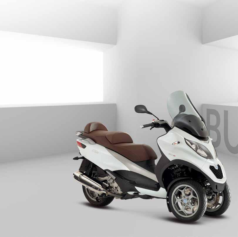MP3 BUSINESS 500 ie LT ABS/ASR 300 ie LT ABS/ASR 500 ie LT DEDICATED TO THOSE WHO WANT TO MOVE WITH A SOBER AND ELEGANT STYLE NEW GRIGIO PULSAR NERO UNIVERSO BIANCO ICEBERG Piaggio MP3 Business has