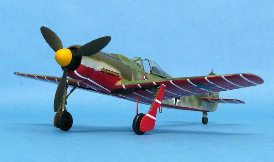 wings, paint the very distinctive black exhaust on the forward fuselage and add the