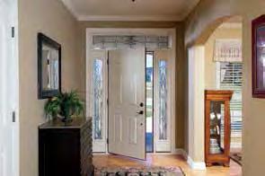 Pella 6 panel ahogany-grain fiberglass entry door prefinished in White paint with matching full light sidelights and rectangular transom with Castile decorative glass.