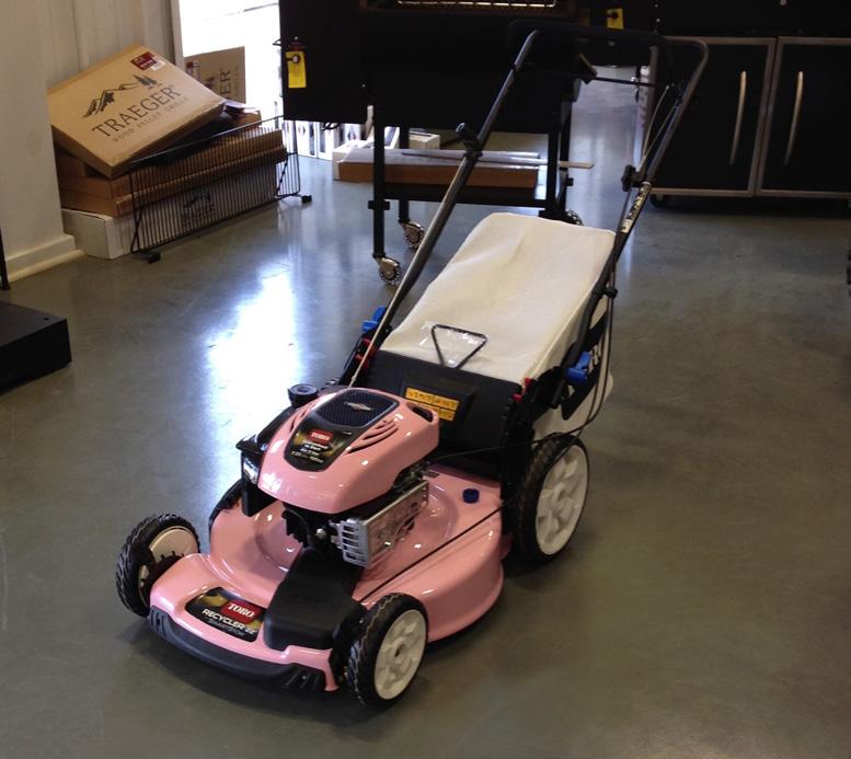 To help raise money for breast cancer awareness, the Ledwell team raffled off a Toro push mower.