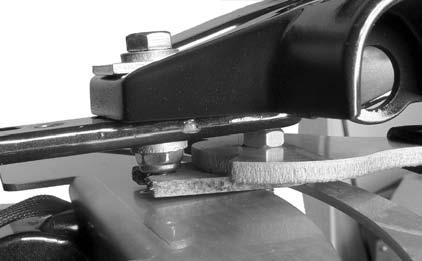 Jam nut Slide steering friction lever under steering arm. Fit notch in steering friction pad around locknut of steering arm screw.