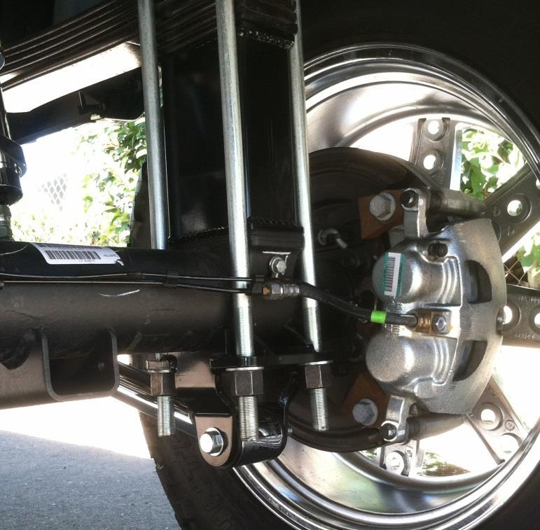 them front the top side down. 6) Install the new FTS lower traction bar axle saddle using the ¾ washers and high nuts supplied and torque to 150ft.-lbs.