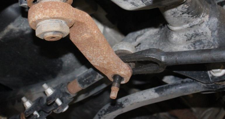 Remove the bolts securing the sway bar mounts to the frame and set the