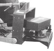 Connect the tractor toplink arm to the top of the mounting assembly (figure 2). Secure with a pin. 6. Adjust support chains, which are attached to the mounting assembly and keyhole plates. figure 1 a.