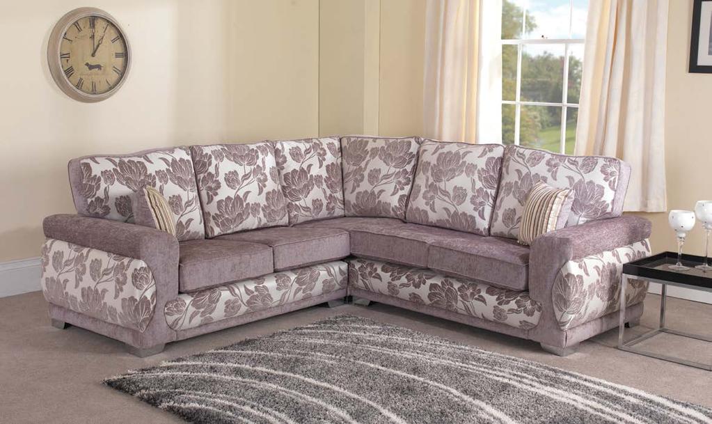 Victoria This contemporary sofa boasts a detailed arm and front panel.