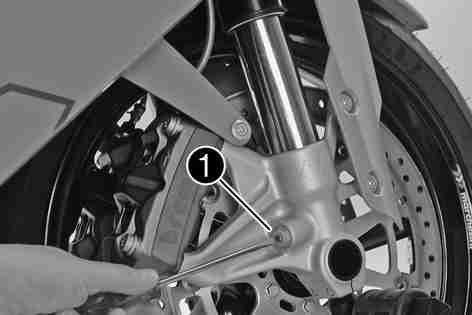 MAINTENANCE WORK ON CHASSIS AND ENGINE 98 Turn adjusting screws clockwise until they stop. The adjusting screws are located at the bottom end of the fork legs.