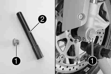 44Fitting front wheel x 700272-10 200487-10 Holding the front wheel, withdraw the wheel spindle. Take the front wheel out of the fork.