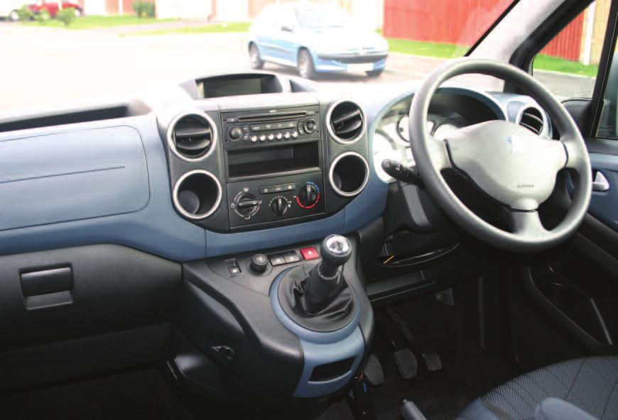 Features such as the height adjustable driver's seat with armrest, radio/ MP3 compatible CD player with remote controls,