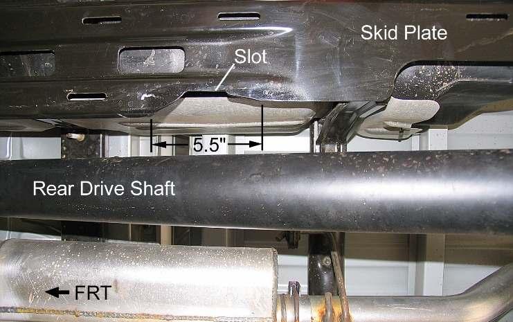 5 inch long section from the gas tank skid plate with a reciprocating saw. See Illustration 23. Illustration 21 3) Attach the junction block to the spacer with the vent hose fitting.