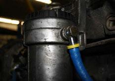 Remove the rear (inlet) banjo bolt, located on the back side of the stock fuel pump.