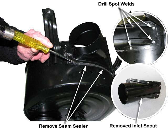 14 Remove the seam sealer from around the air cleaner housing inlet snout with a hammer and small chisel or flat blade screw driver. Centre punch all of the spot welds around the inlet snout.