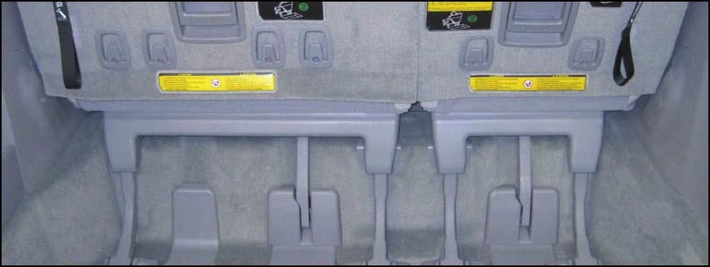 Adjust the tension on the rear legs for the 3rd row seats on the