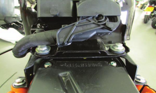 FIG.A 1 Remove the battery access cover, fuel tank cover, and