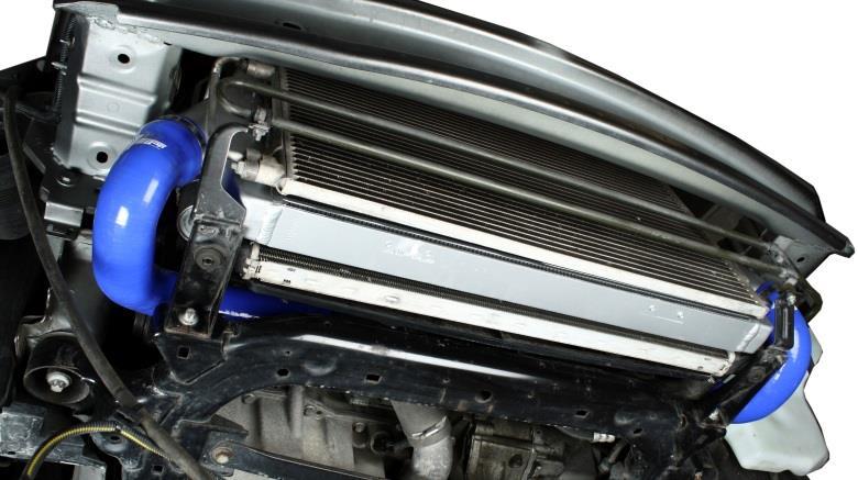 24. Install both hoses on intercooler inlet and outlet.
