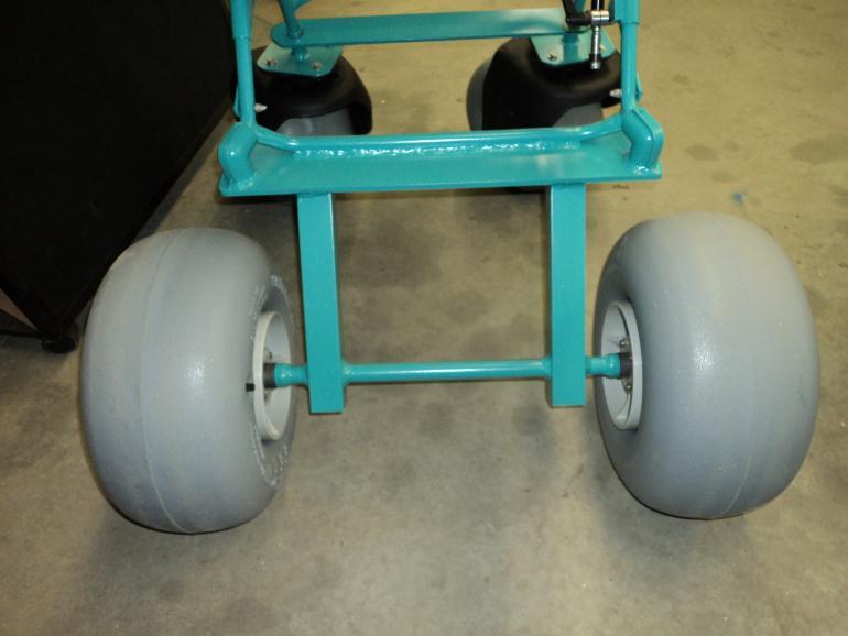 The front of the stroller frame had to have additional aluminum metal stock in order to accommodate the large balloon tires without interfering with chair function.