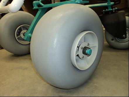 Figure 24: Polyurethane balloon tired, front wheels. The rear wheels are smaller in diameter than the front tires to accommodate for the plastic casters that we ordered along with the wheels.