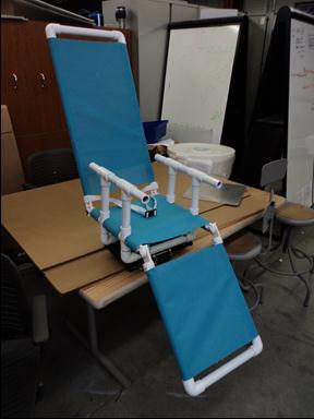 Armrests were also made out of PVC and connected to the bottom portion of the seat. The entire seat is bolted securely to the existing frame seat plate in four places.