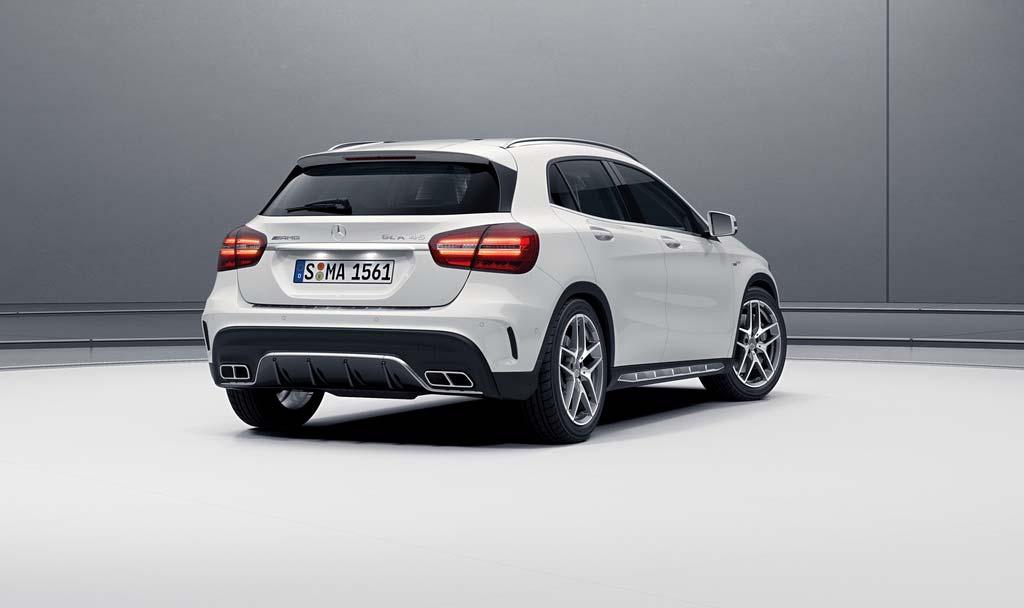 AMG sports exhaust system with two integral, chrome-plated tailpipe trim elements in a twin tailpipe design Sporty side sill panels with inserts in