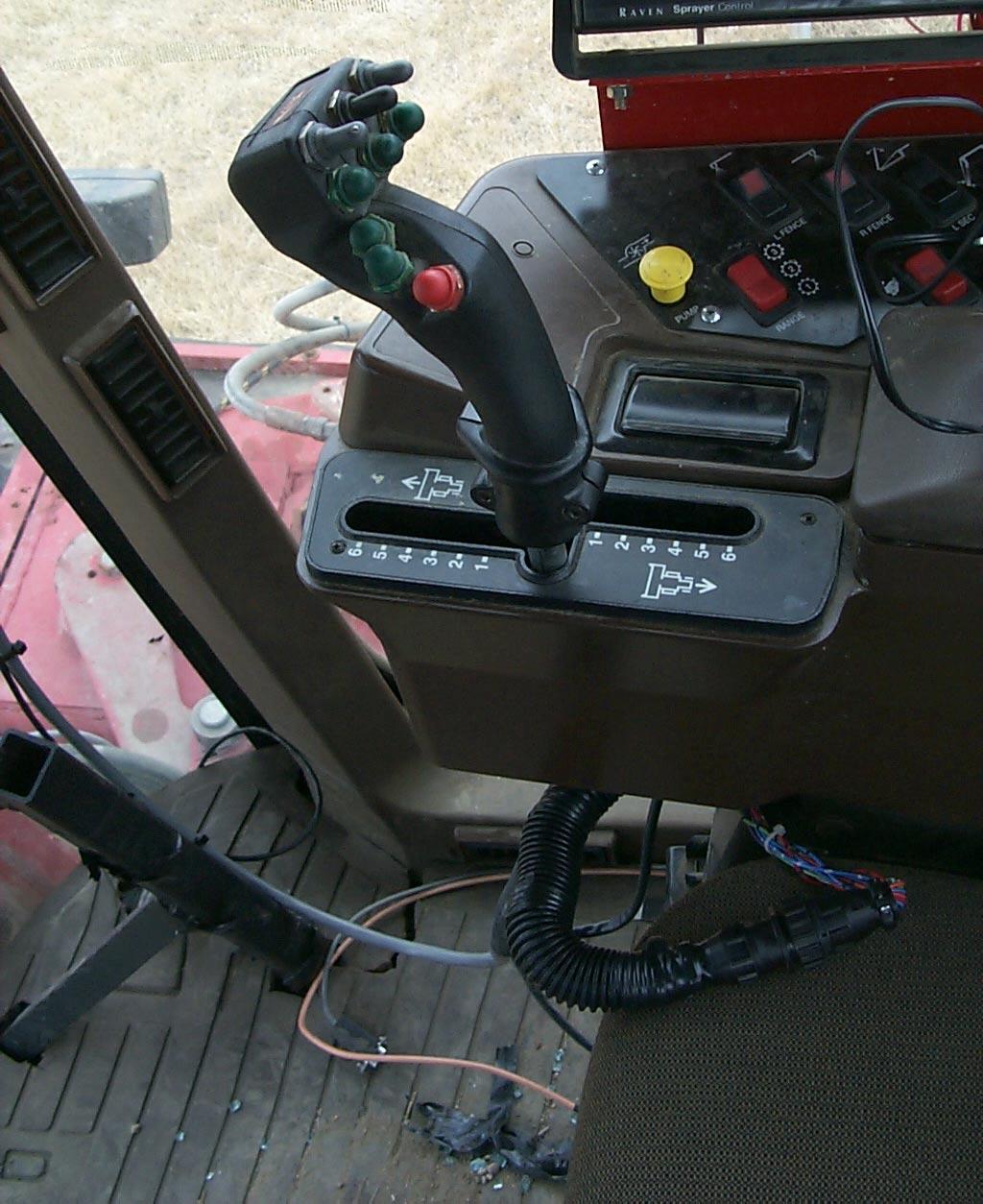 2. Locate the 16-pin AMP connector in the cable from the joystick in the cab. Connect the UC4 power cable (Item C10) between this connection.