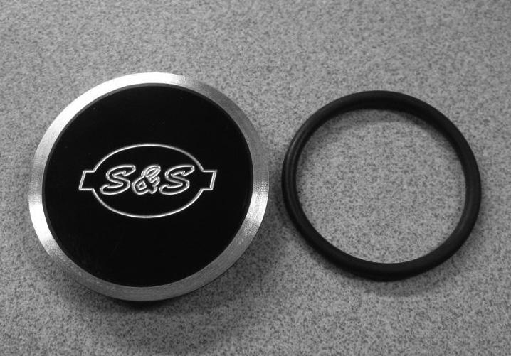 3. Push the cap into the air cleaner cover until you feel the cap snap into place. Picture 1 Installing the S&S Muscle Air Cleaner Cover for E&G Carburetors using S&S Stealth Air Cleaner Kit 1.