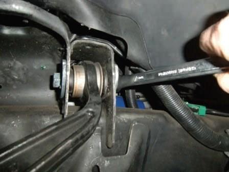 Remove the upper control arm from the frame rails.