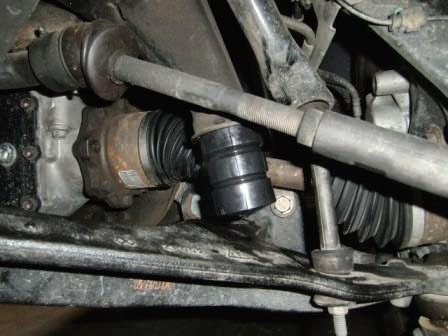 Install the ReadyLIFT front shock using the factory hardware. Do not tighten at this time.