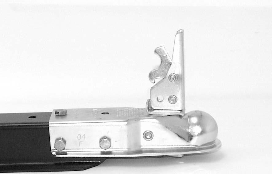 Place drawbar () on axle support () and bed lock bracket ().
