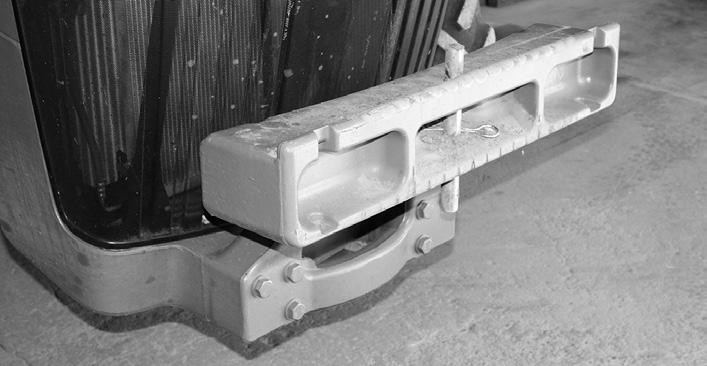 Figure C24 Quick Attach Frame on John Deere Weight Bracket Insert the frame lock beneath the weight bracket and around the 1 pin or