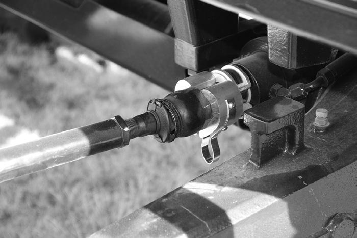 Figure C46 Hydraulic Hose Pump Ports The front mount frame requires a restriction of the turning radius of the TS6.120 tractor with the 320/90R46 tires.