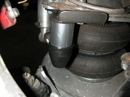 Note: It is acceptable to let the suspension bottom on the air spring. However, if your tire hits the inner fender well before the air spring bottoms out, this bump stop must be installed. 4.