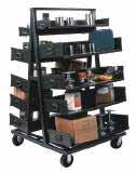ADJUST-A-TRAY TRUCKS A portable material handling system for all work areas Base frame made of 1 1/2" x 1 1/2" x 3/16" angle Slotted uprights made of 11 ga.
